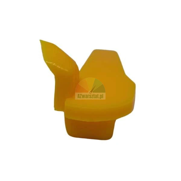 Mały żółty element plastikowy, ślizg lub zatrzask do mechanizmu, widok z boku na białym tle.