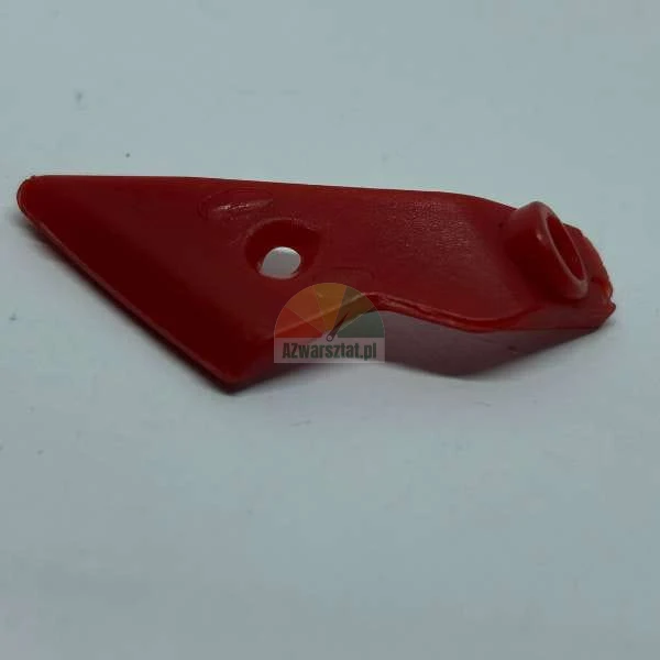 Czerwony plastikowy element z otworem montażowym.