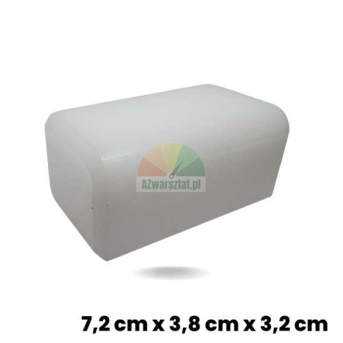 Biały ślizg podnośnika (kostka) o wymiarach 7,2 x 3,8 x 3,2 cm wykonany z tworzywa sztucznego.