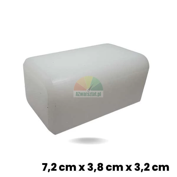 Biały ślizg podnośnika (kostka) o wymiarach 7,2 x 3,8 x 3,2 cm wykonany z tworzywa sztucznego.