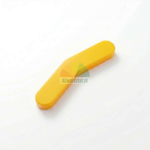 Żółty element plastikowej osłony stopki montażowej o wygiętym kształcie