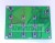 Zielona płytka drukowana PCB z kilkoma czarnymi przyciskami typu tact-switch.
